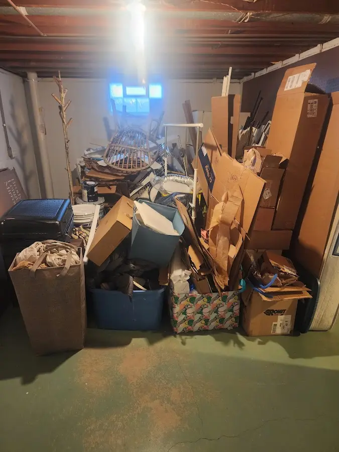 Roll-off dumpster container at job site for Yard Waste Dumpster Rental in Camden